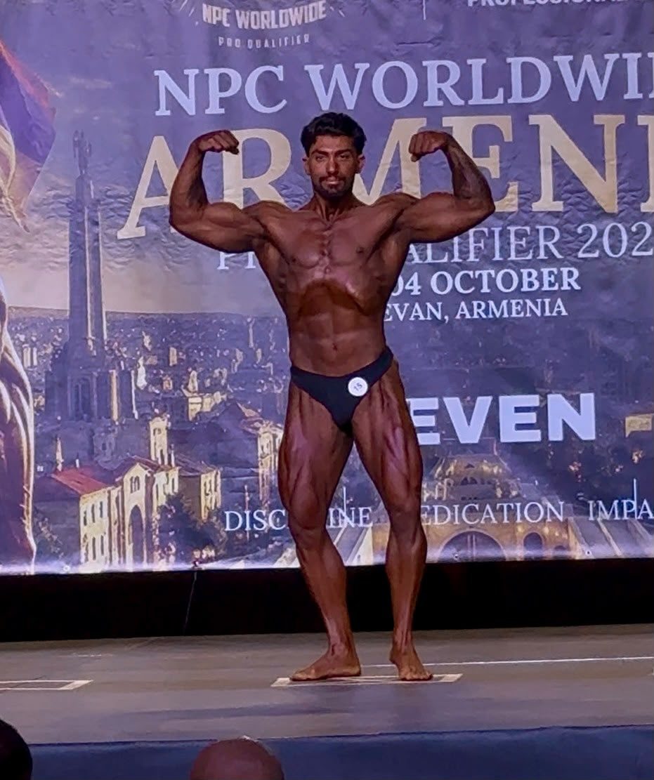 Team Maalouf athlete competing on stage in Yerevan